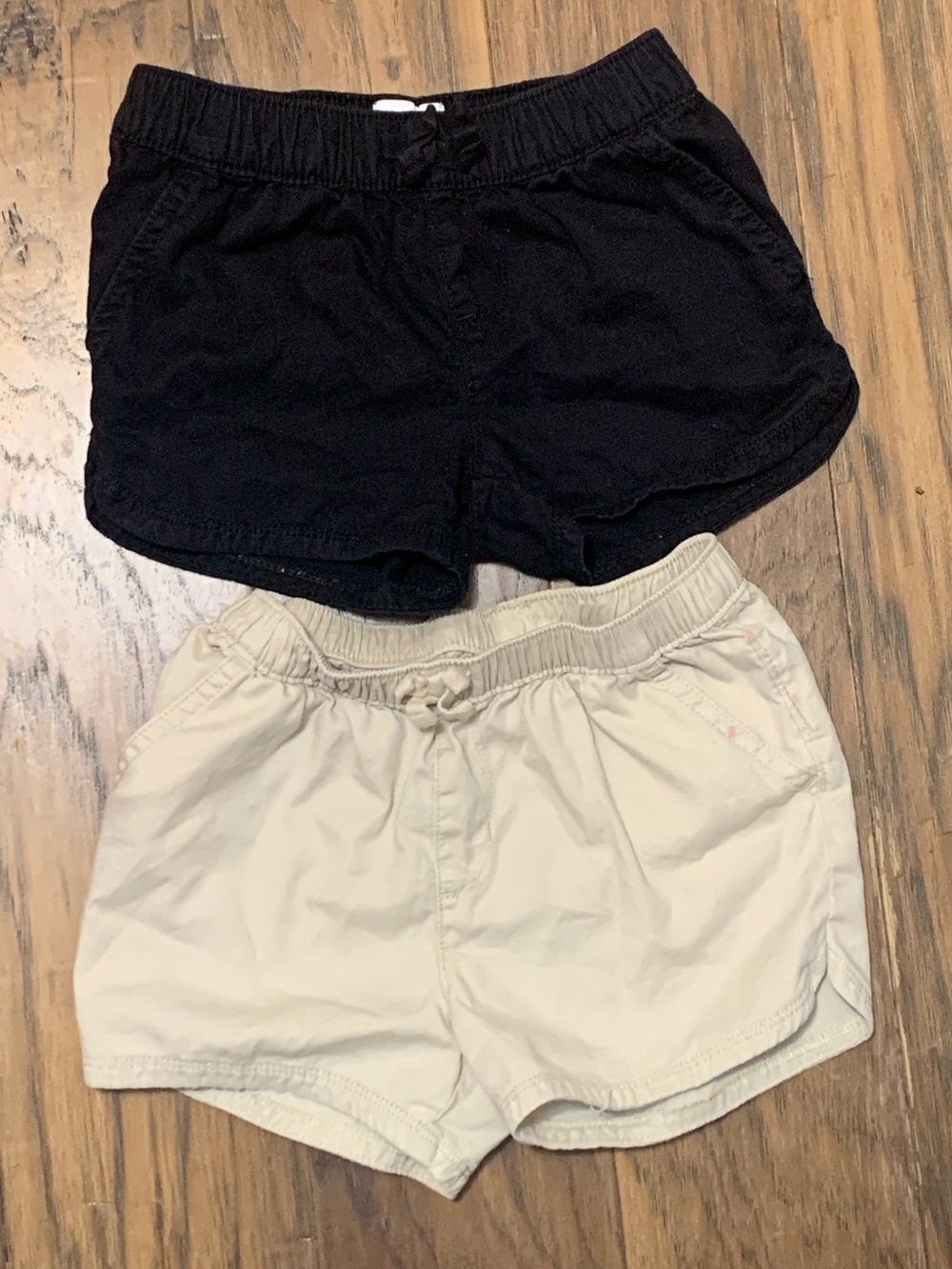 Pair of Girl’s Elastic-Waist Casual Shorts - Black and Khaki. Will Separate.